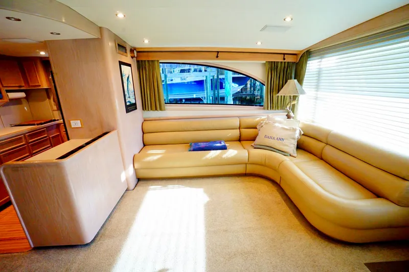 Slide: The Image of Luxurious 1991 G&S 58 yacht interior with beige leather seating and elegant decor. - 32