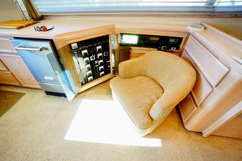 Slide: The Image of Control panel and chair in a 1991 G&S 58 yacht interior. - 35