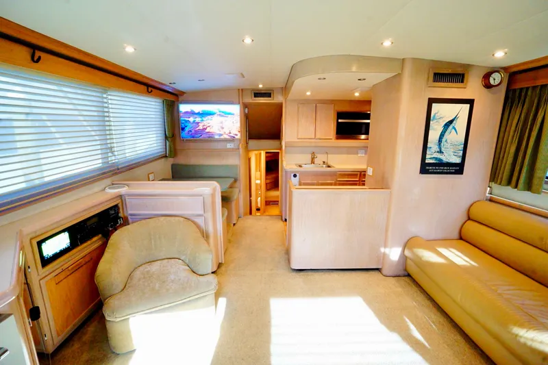 Slide: The Image of Luxurious interior of a 1991 G&S 58 yacht with modern amenities and elegant furnishings. - 36