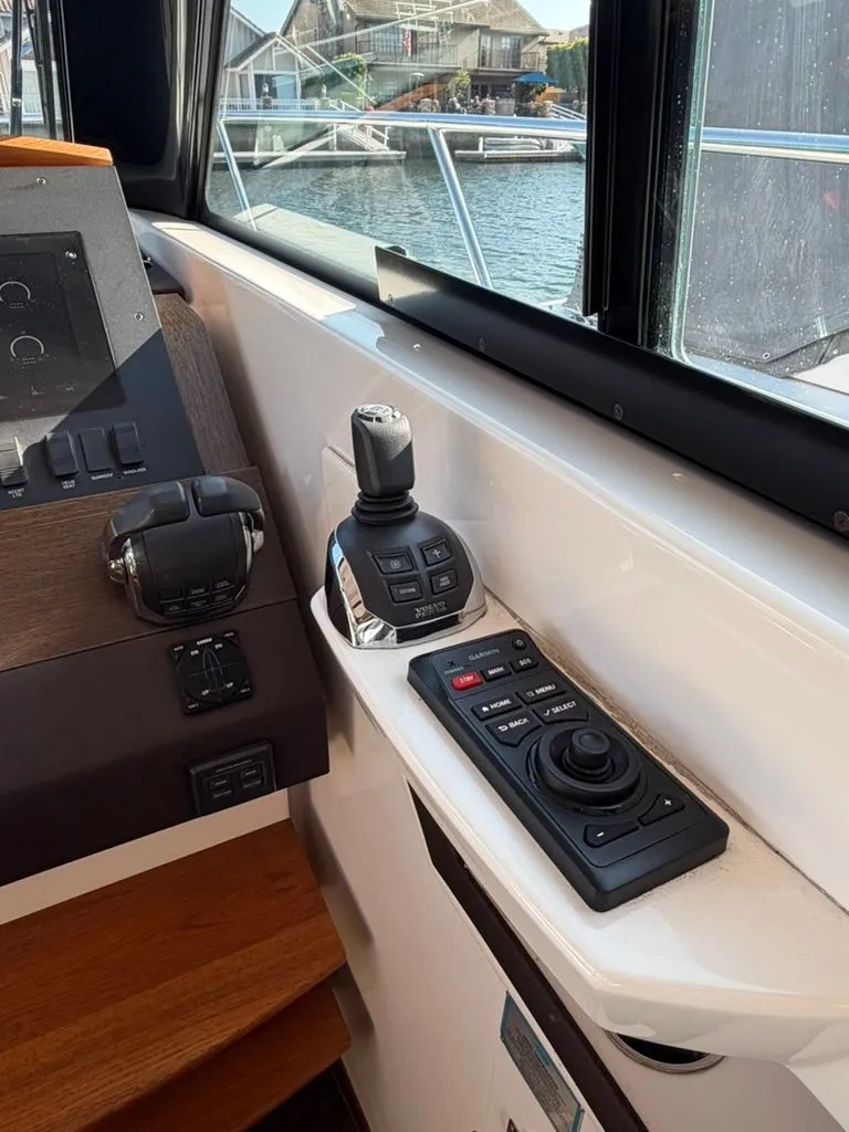 Slide: The Image of Tiara Yachts C39 Coupe 2017 helm with joystick controls. - 11