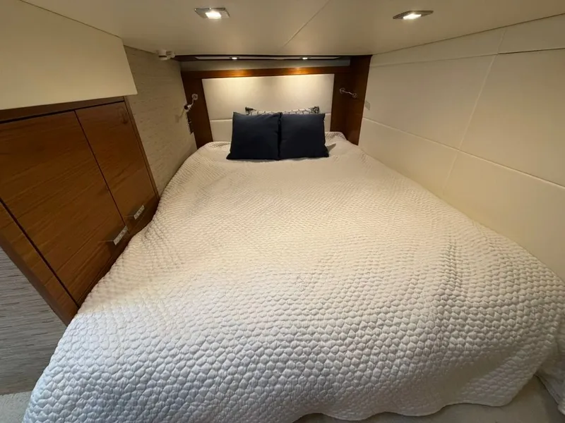 Slide: The Image of Interior of 2017 Tiara Yachts C39 Coupe with cozy bed. - 16