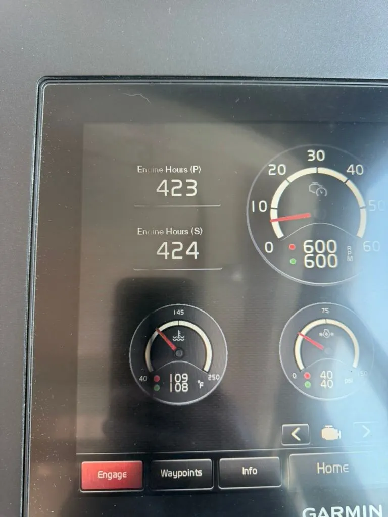 Slide: The Image of Garmin display on Tiara Yachts C39 Coupe 2017 showing engine hours. - 23
