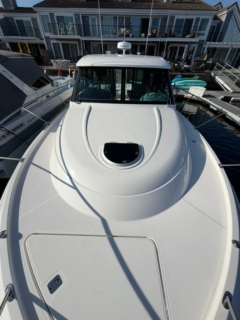 Slide: The Image of 2017 Tiara Yachts C39 Coupe docked at marina. - 28