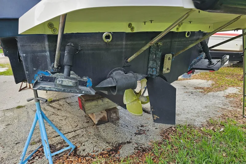 Slide: The Image of 2021 Cutwater C-28 boat stern with propeller and rudder on stands. - 5