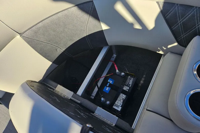 Slide: The Image of Battery in seat compartment of a 2021 Crest 220 DLX boat. - 28