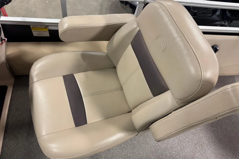 Slide: The Image of 2018 Sun Tracker Fishin' Barge 24 XP3 beige captain's chair with armrests and stitching detail. - 12