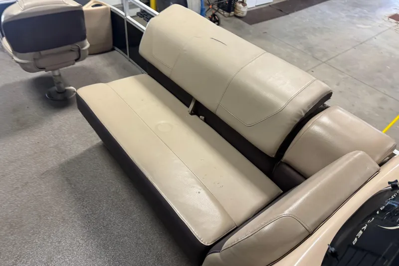 Slide: The Image of 2018 Sun Tracker Fishin' Barge 24 XP3 interior seating with beige upholstery. - 18