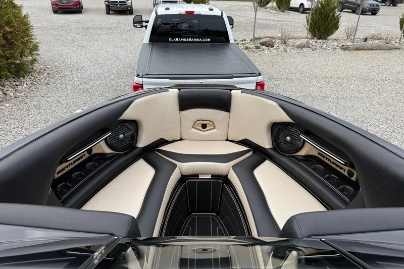 Slide: The Image of Interior of a 2019 Centurion Ri257 boat with luxurious seating and audio system. - 17