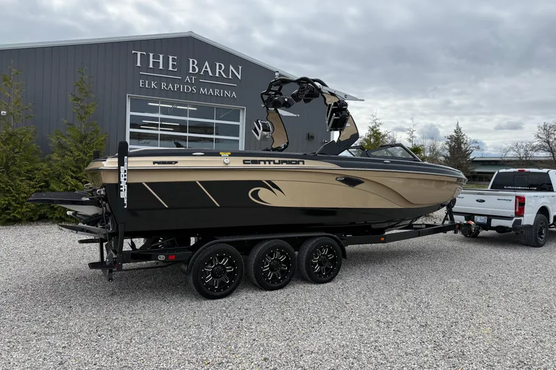 Slide: The Image of 2019 Centurion Ri257 boat on trailer at Elk Rapids Marina. - 6