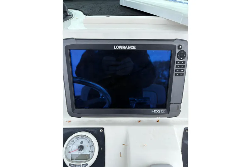 Slide: The Image of Lowrance HDS12 display on 2015 Mako 214 Center Console boat dashboard. - 5