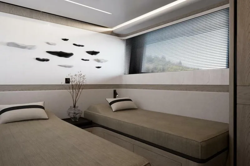 Slide: The Image of Luxurious bedroom in Pearl 100 Hybrid yacht, 2026 model. - 10