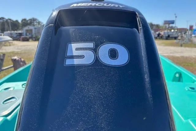 Slide: The Image of Mercury 50 horsepower outboard motor on a 1971 Chrysler 15 CC boat. - 11