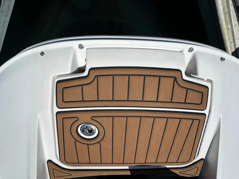 Slide: The Image of 2014 Sea Ray 260 Sundeck with teak flooring on deck. - 27
