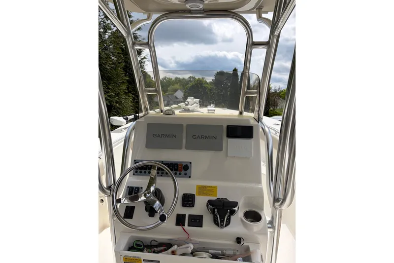 Slide: The Image of 2024 Key West 244 Center Console boat dashboard with Garmin navigation system. - 6