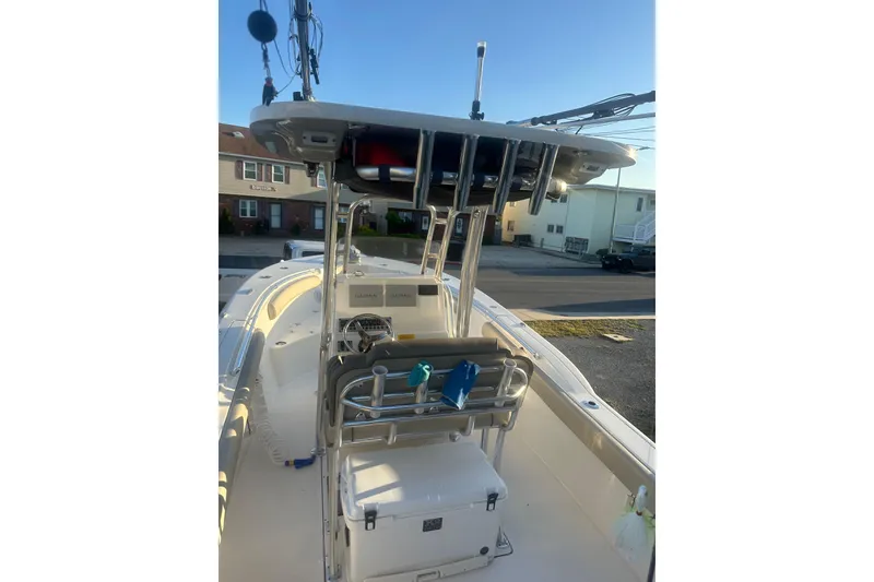 Slide: The Image of 2024 Key West 244 Center Console boat with T-top and fishing equipment. - 7