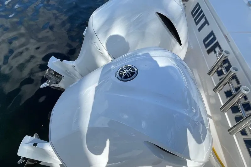Slide: The Image of Twin Yamaha outboard engines on a 2016 Pursuit OS 325 Offshore boat. - 2