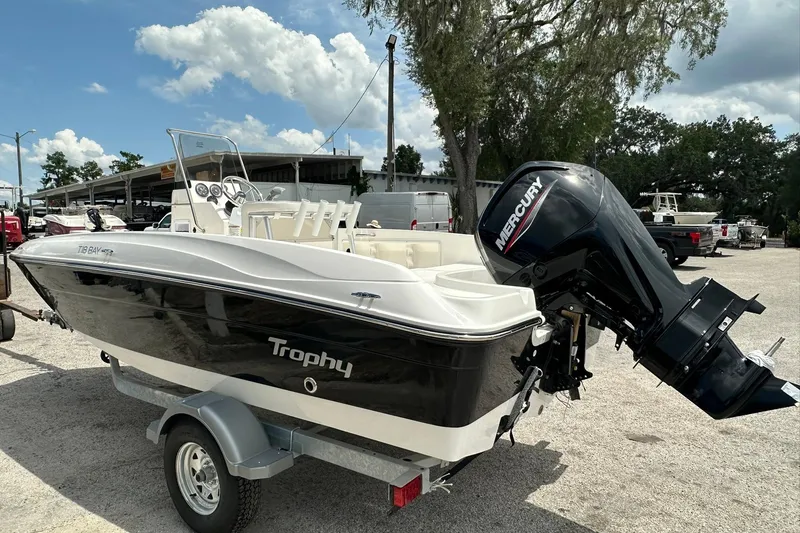 Slide: The Image of 2026 Bayliner Trophy T18 boat with Mercury outboard motor on trailer. - 38
