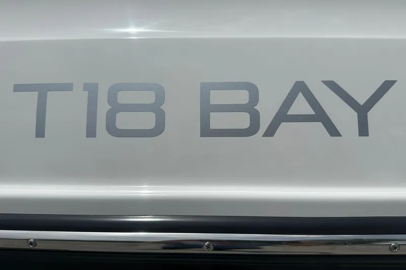Slide: The Image of Bayliner Trophy T18 Bay 2026 model nameplate on boat exterior. - 4