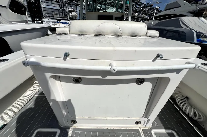 Slide: The Image of Contender 35 LS 2012 boat deck with storage compartment and seating. - 31
