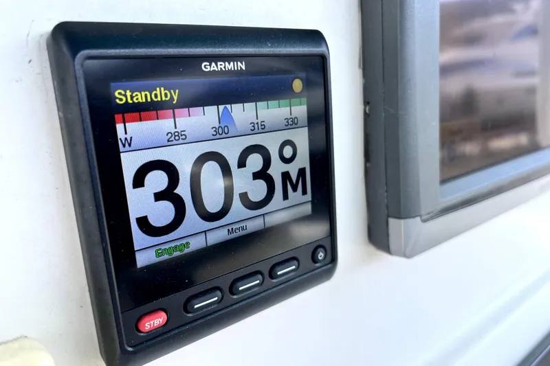 Slide: The Image of Garmin marine display showing compass heading on Contender 35 LS, 2012 model. - 45