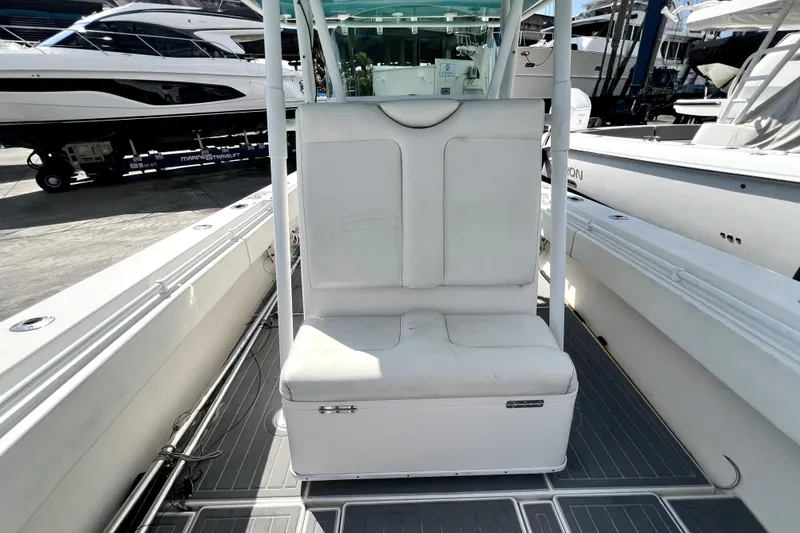 Slide: The Image of 2012 Contender 35 LS boat interior with white seating and sleek design. - 47