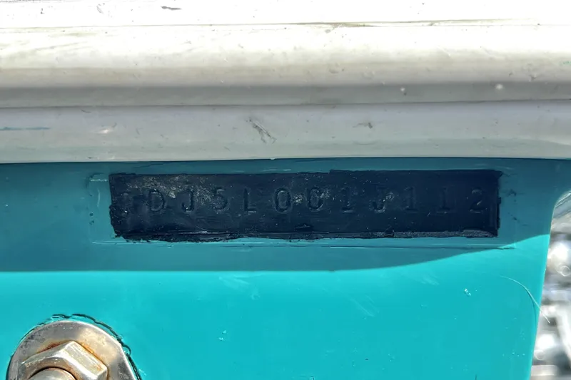 Slide: The Image of Hull identification number on a 2012 Contender 35 LS boat. - 7