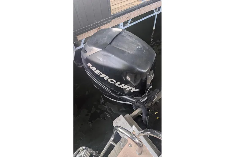The Image of Mercury outboard motor on 2012 Harris FloteBote 230 Grand Mariner SEL pontoon boat. - 1
