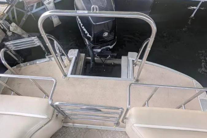 Slide: The Image of 2012 Harris FloteBote 230 Grand Mariner SEL pontoon boat with outboard motor and railing. - 10
