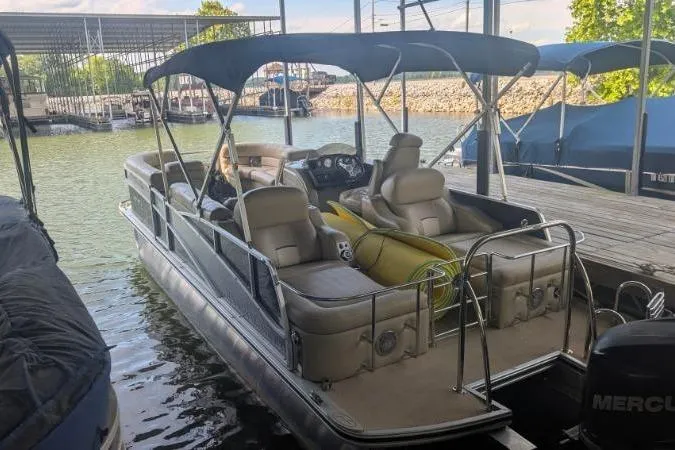 Slide: The Image of 2012 Harris FloteBote 230 Grand Mariner SEL pontoon boat docked in a marina. - 15