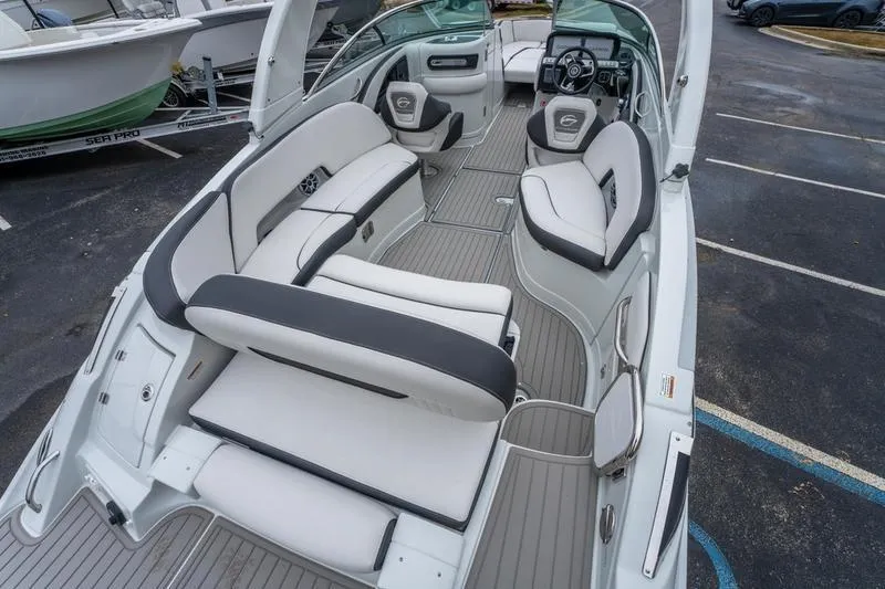 Slide: The Image of 2026 Crowline 290 XSS boat interior with luxurious seating and modern dashboard. - 20