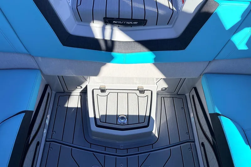 Slide: The Image of Interior of 2026 Nautique Super Air Nautique G23 boat with blue and gray seating. - 39