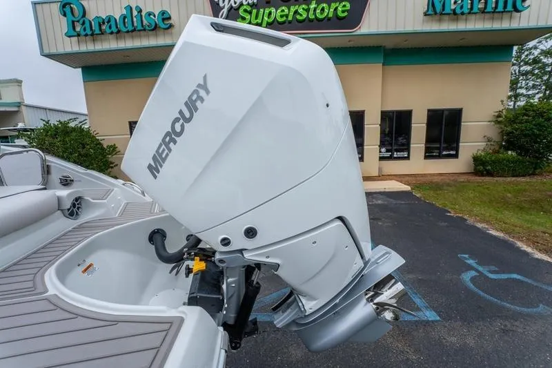 Slide: The Image of 2026 Crownline 318 XSS with Mercury outboard motor at Paradise Marine Superstore. - 24