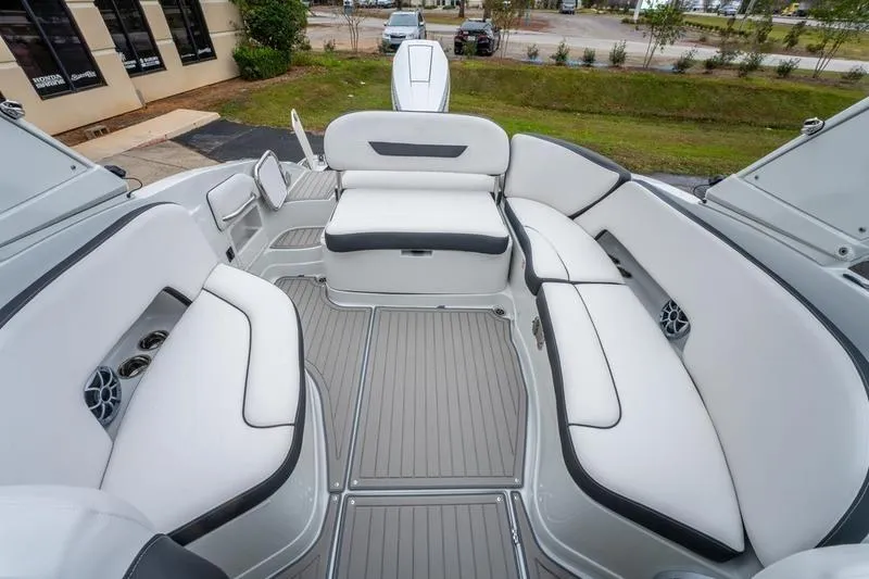 Slide: The Image of 2026 Crownline 318 XSS boat interior with spacious seating and sleek design. - 26