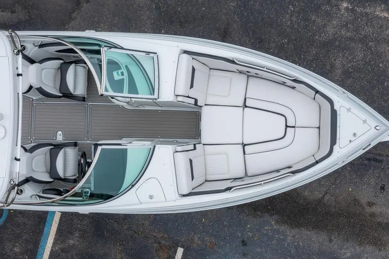 Slide: The Image of Top view of 2026 Crownline 318 XSS boat with spacious seating and sleek design. - 30