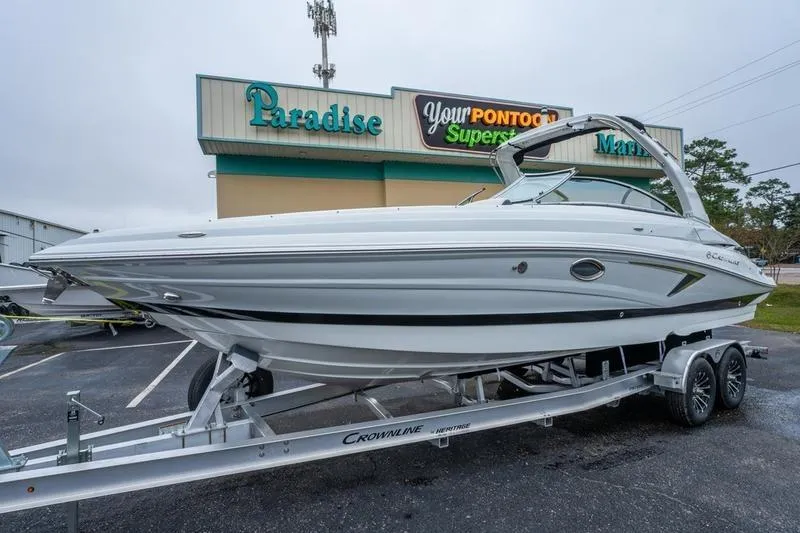 Slide: The Image of 2026 Crownline 318 XSS boat on trailer at Paradise Marina. - 4