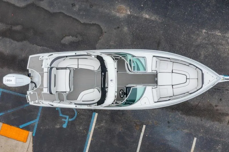 Slide: The Image of Overhead view of 2026 Crownline 318 XSS boat in parking lot. - 9