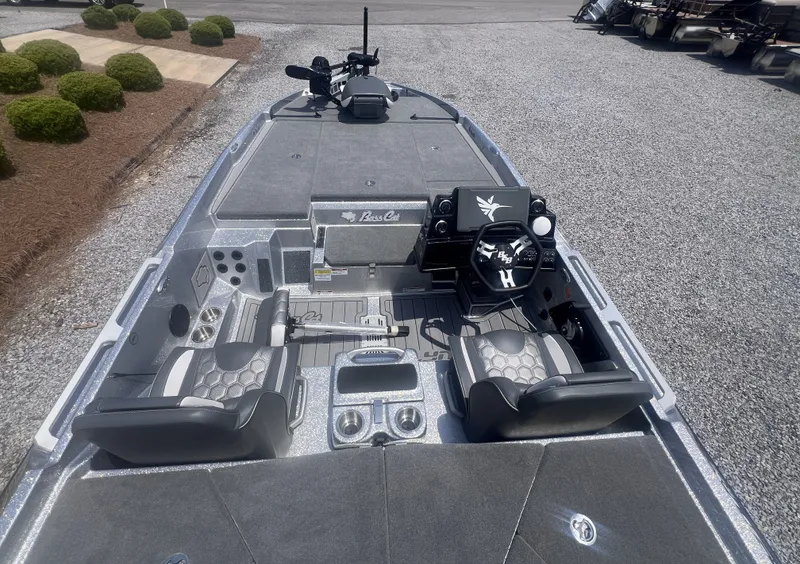 Slide: The Image of 2026 Bass Cat Lynx STS boat with modern cockpit design. - 10