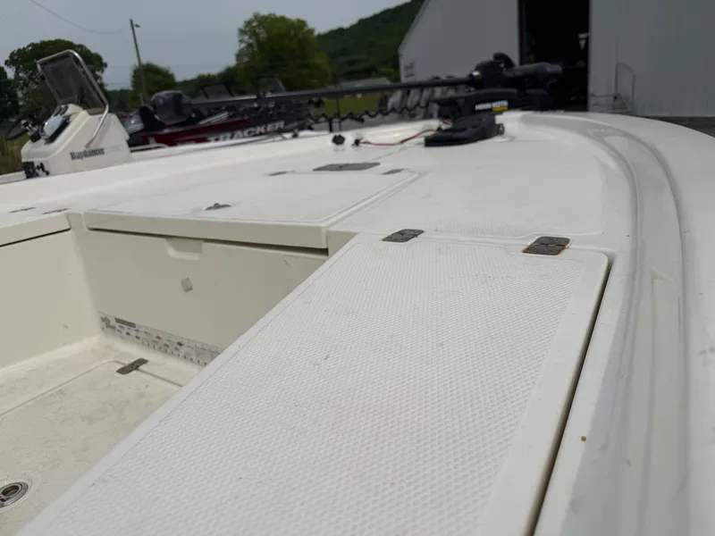 Slide: The Image of Close-up of a 2017 Mako Skiff 19 CPX boat deck. - 12
