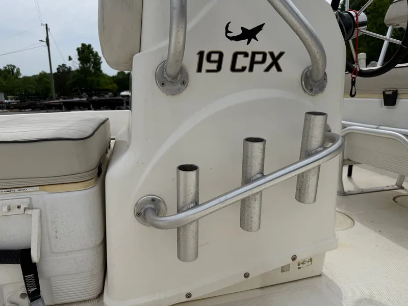 Slide: The Image of 2017 Mako Skiff 19 CPX with rod holders and seating. - 16