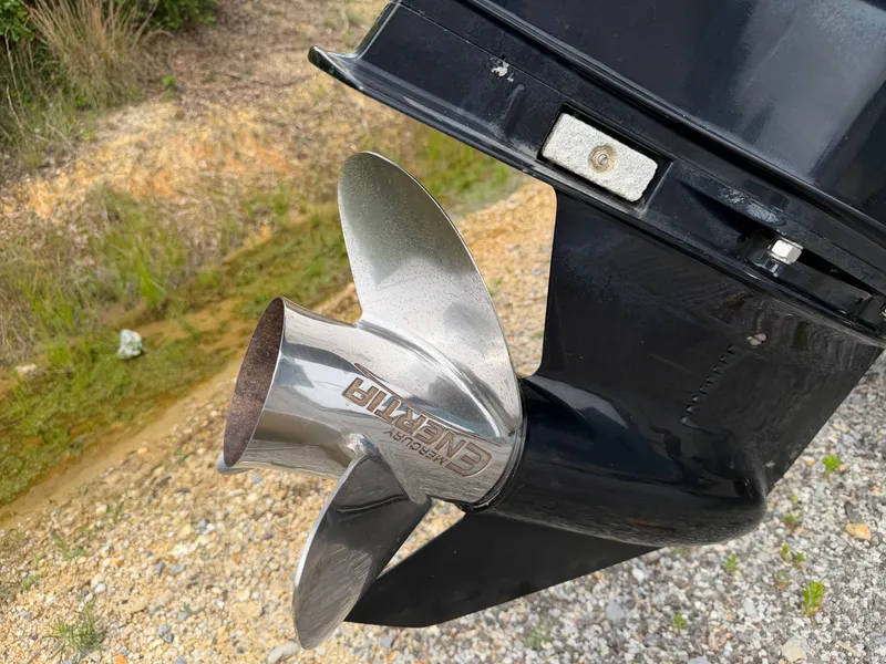 Slide: The Image of Close-up of a Mercury propeller on a 2017 Mako Skiff 19 CPX. - 22