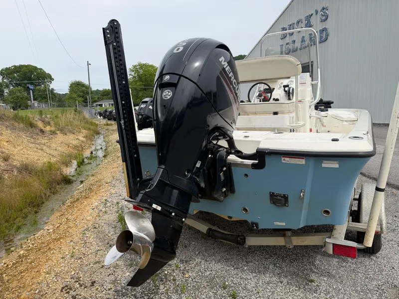 Slide: The Image of 2017 Mako Skiff 19 CPX with Mercury engine on trailer. - 3