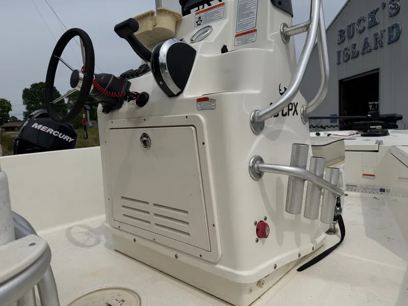 Slide: The Image of 2017 Mako Skiff 19 CPX console with Mercury engine. - 7