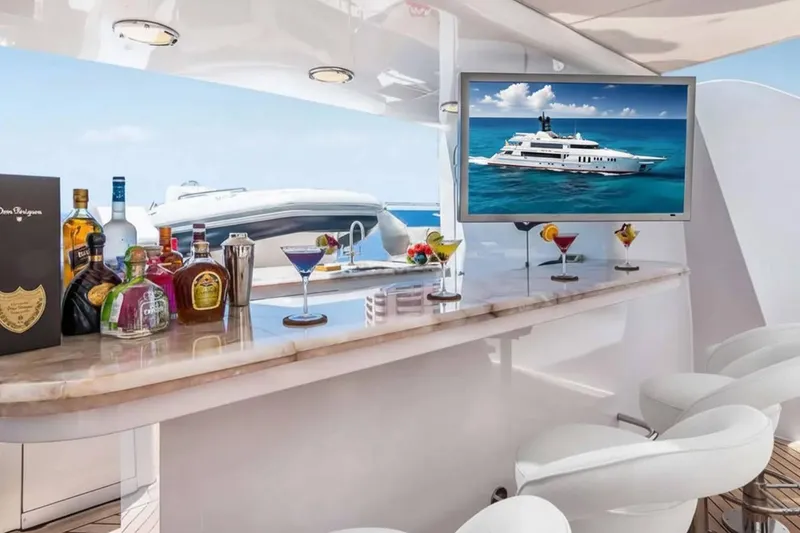 Slide: The Image of Luxurious bar on 2003 Trinity Yachts motoryacht with drinks and ocean view. - 32