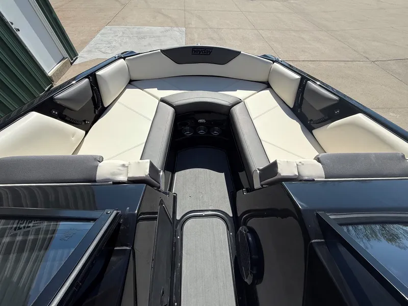 Slide: The Image of Interior view of 2023 Heyday WTSurf boat with seating area. - 11