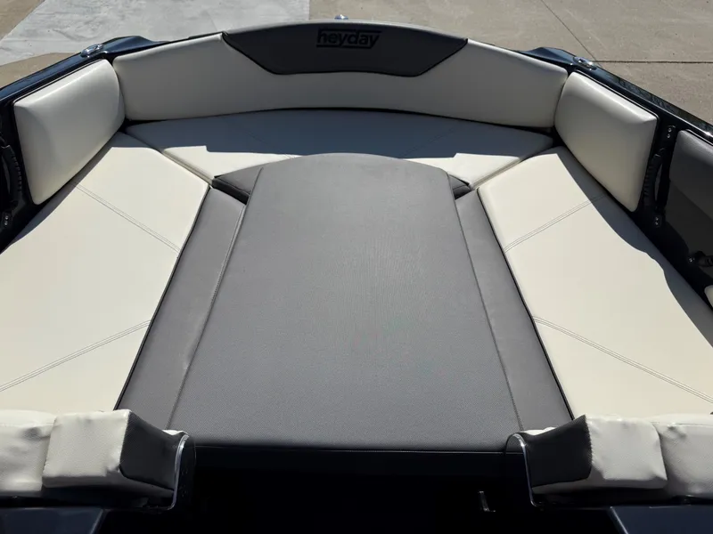 Slide: The Image of Interior of 2023 Heyday WTSurf boat with beige upholstery. - 12