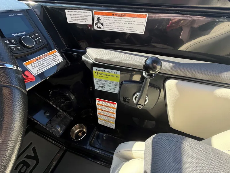 Slide: The Image of Interior of 2023 Heyday WTSurf with control lever and capacity notice. - 19