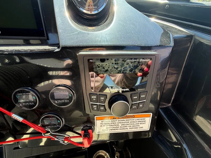 Slide: The Image of Dashboard of 2023 Heyday WTSurf with controls and warning label. - 20