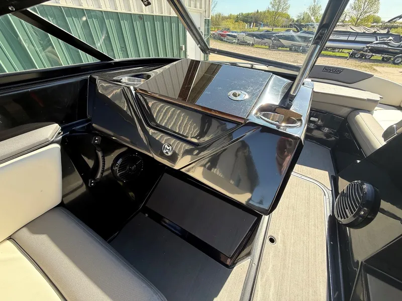 Slide: The Image of Interior view of 2023 Heyday WTSurf boat with modern features. - 22