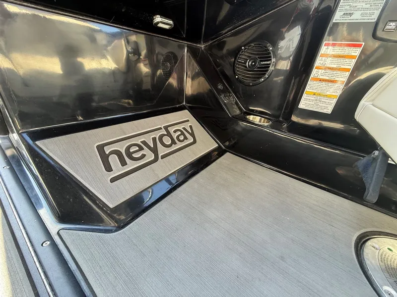 Slide: The Image of Interior of 2023 Heyday WTSurf with logo and speaker. - 23
