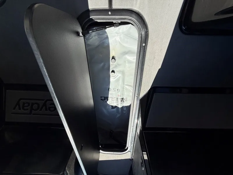 Slide: The Image of Heyday WTSurf 2023 boat storage compartment with open hatch. - 27